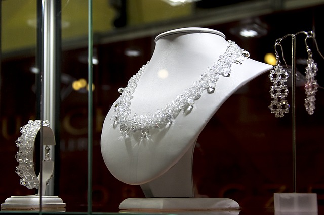 a beautiful white necklace is paced on the showcase to show you how you can increase Sales in Jewelry Retail Store
